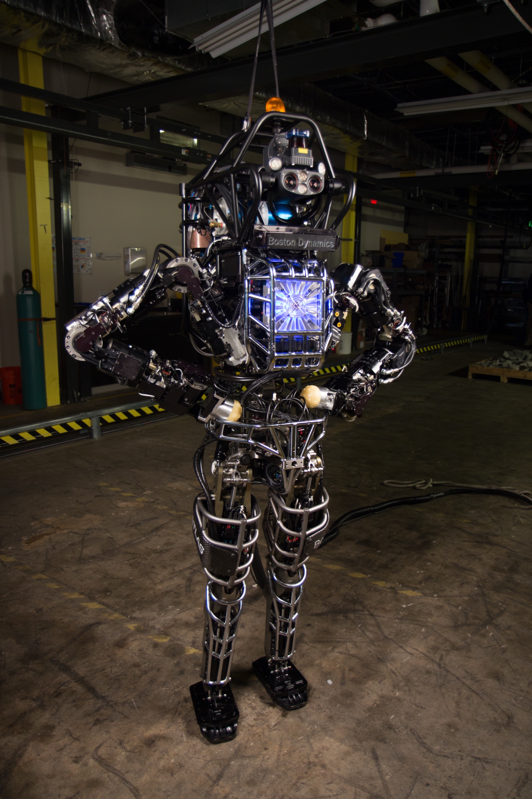 Figure 11.2: Legacy Hydraulic Atlas (2013–2023) — a decade of hydraulic actuation + optimization-based MPC+QP pushing the orthodox frontier. — source: Wikimedia Commons (DARPA/US Navy, public domain), fair use for academic review